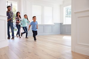 family entering new house on moving day